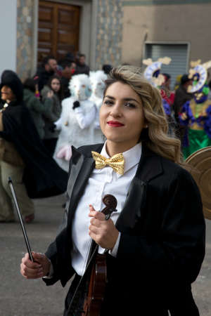 March 05, 2019 Montemarano, Italy: Traditional carnival parade in Montemarano, Avellino, southern Italy. Musician maskのeditorial素材