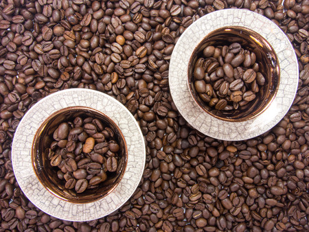 two coffee cups coffee backgroundの写真素材