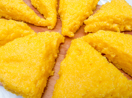 mamaliga polenta triangles on wood
