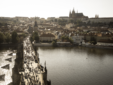 charles bridge in prague in sunset light view from old town bridge tower old photo styleの写真素材
