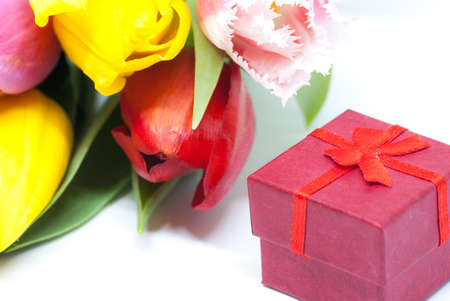 tulips and ring box on white love proposal marriage conceptの写真素材