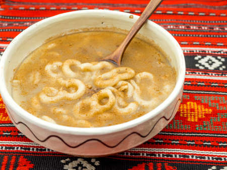 clay bowl with traditional romanian dish mucenici orthodox celebration on 9th of marchの写真素材