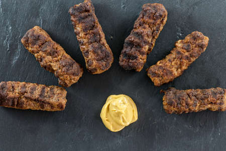 delicious grilled minced meat rolls mici ori mititei traditional romanian and balkan dish served...