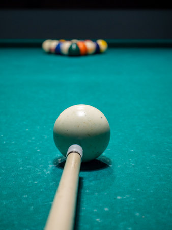 Billiard balls on green table in billiard club or billiard club