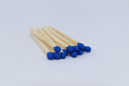 matchsticks with bluehead lying in the studioの写真素材