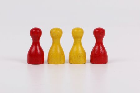 Colorful wooden toques in a row