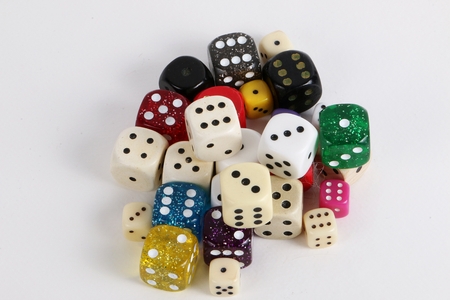 man colorful dices in the studio