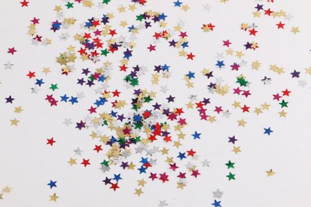 colorful stars decoration lying in the studioの写真素材