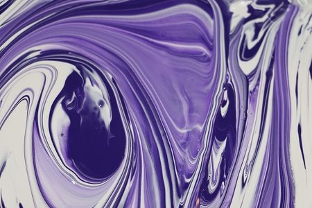 two painting colors are mixed togetherの写真素材