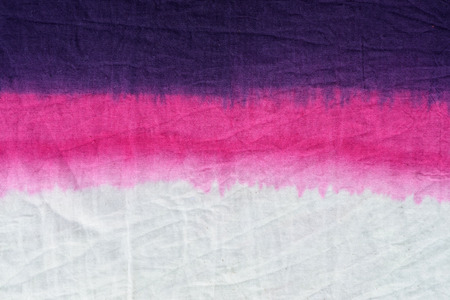 tie dye pattern dip dyed technique on cotton fabric background.の写真素材