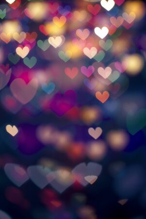 defocus bokeh light filtered heart abstract background.
