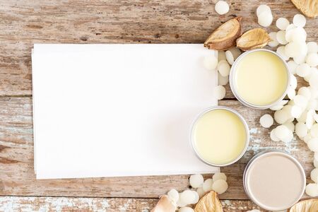 homemade natural lip balm in tin pots on blank recipe paper, how to make homemade natural lip balm, D.I.Y. projects,の写真素材