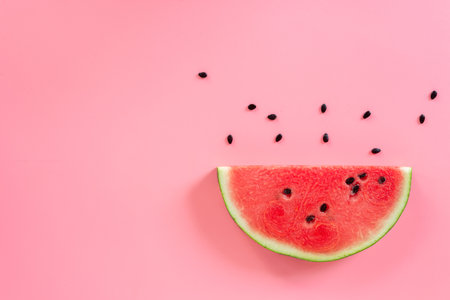 sliced watermelon on pink background.の写真素材
