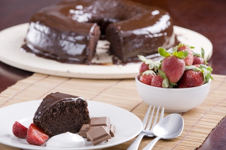 chocolate cake with strawberries and meringueの写真素材