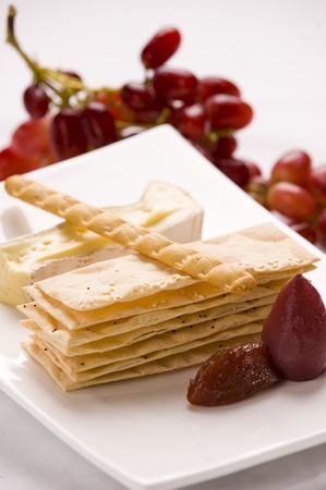 pastry stack with cheese,fig and grapesの写真素材