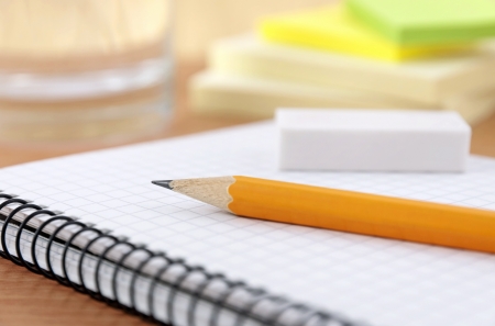 Writing equipment on desk の写真素材