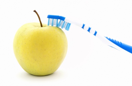 Apple and toothbrushの写真素材