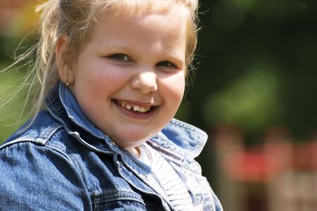 Happy little girl portraitの写真素材