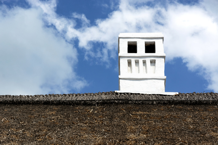 Old chimney on farmhouseの写真素材