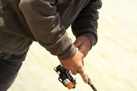 Angler is spinning at Lake Balaton, Hungaryの写真素材