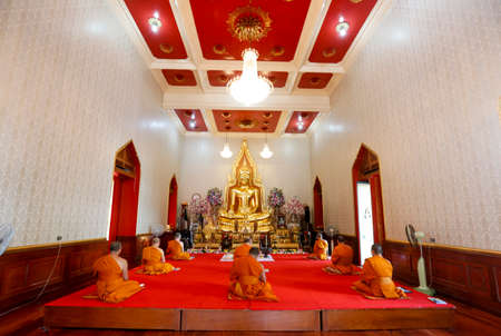 Bangkok, thailand March 25, 2020, 
Buddhist monks pray blessing for people affected by the coronavirus disease (COVID-19) outbreak, at a traimit templeのeditorial素材