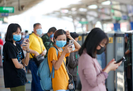 Bangkok, Thailand March 25, 2020.
A passengers on a BTS Station wear face masks to protect...
