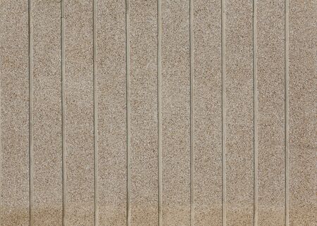 Pebbles Small stones on concrete wall. Color stone in background.の写真素材