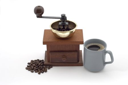 Coffee grinder with mugの写真素材