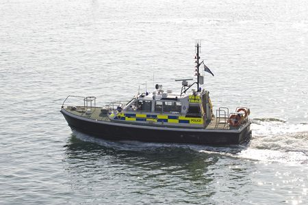 A police boat in Portsmouth harbourの写真素材