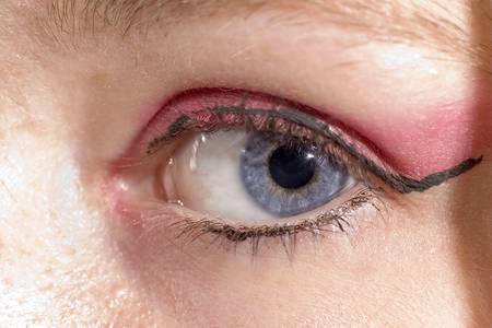 A girls eye with colourful make upの写真素材