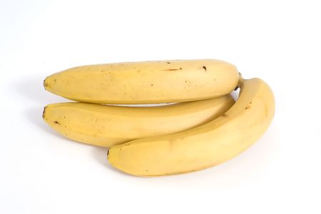 A bunch of bananas on a white backgroundの写真素材