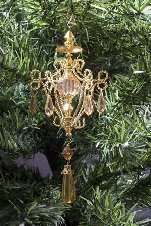 A hanging christmas decoration on a treeの写真素材