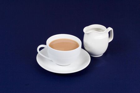A cup of tea and milk jugの写真素材
