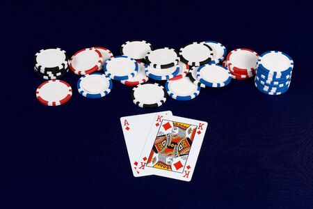 Ace & king of diamonds together with poker chipsのeditorial素材