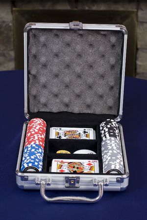 A poker set with cards and chips in a metal caseのeditorial素材