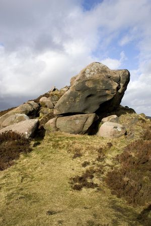 A rocky outcrop on top of a hillの写真素材