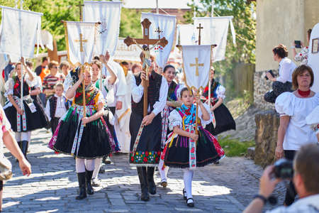 Procession during an Easter Holy Mass in an old village - Holloko, Hungary country