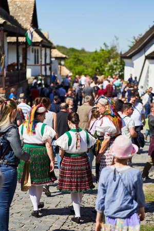 women dressed in a traditional folk costumes in Holloko village, Hungary country