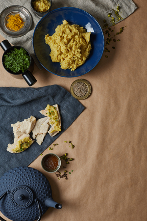 a top view of home-made jewish humus and flatbreadの写真素材