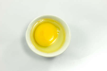 Egg yolk in the middle of the egg white.