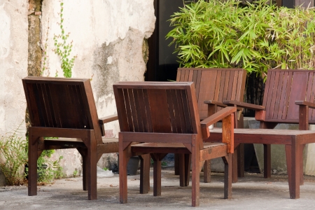 Tables and chairs in front of the store の写真素材