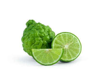 Bergamot fruit with cut in half and leaf isolated on white background. Clipping path.