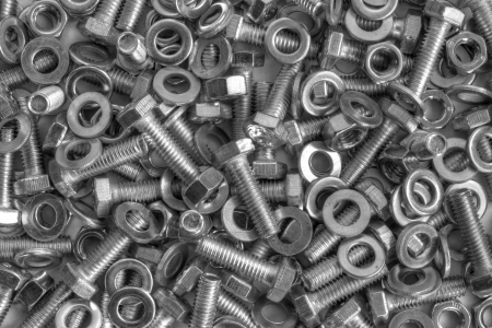 Metal background - pile of metal componentsの写真素材