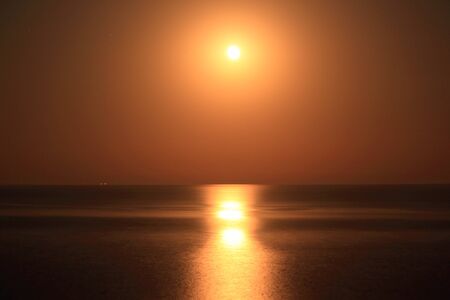 Moon light on waterの写真素材