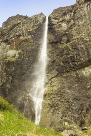 High mountain landscape with waterfallの写真素材