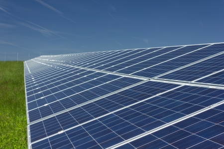 Electric photovoltaic solar panels cells on a fieldの写真素材