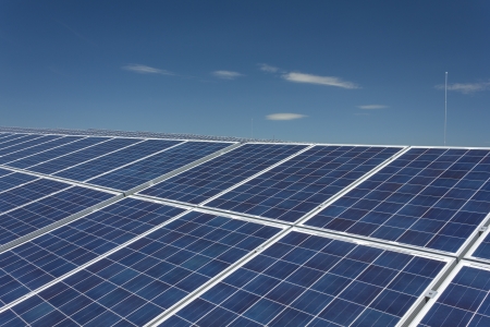 Electric photovoltaic solar panels cells on a fieldの写真素材