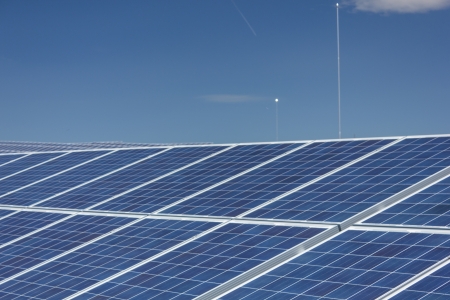 Electric photovoltaic solar panels cells on a fieldの写真素材
