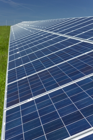 Electric photovoltaic solar panels cells on a fieldの写真素材