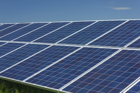 Electric photovoltaic solar panels cells on a fieldの写真素材